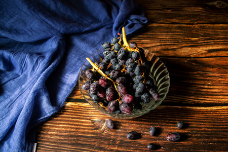 A closeup shot of grapes in a vaseの写真素材