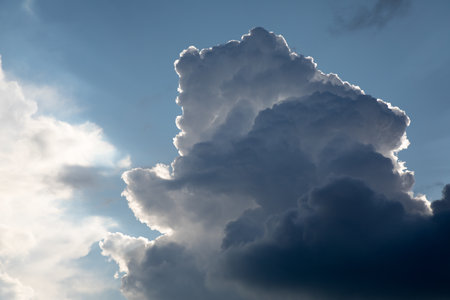 A low angle shot of a nimbus cloud with silver linings