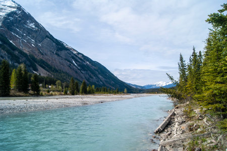 A low angle shot of a river and mountainsの写真素材
