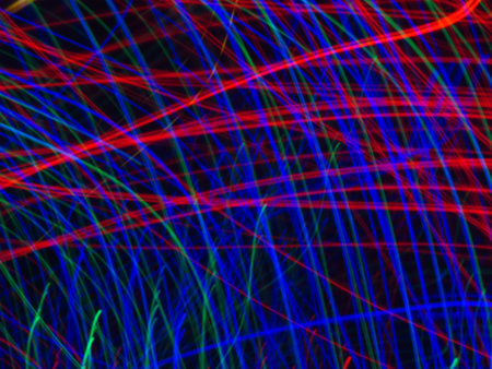 A shot of interlaced rhythmic light trajectory - perfect for futuristic backgrounds or wallpaper