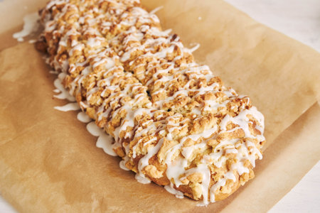 A closeup shot of a poppy seed roll