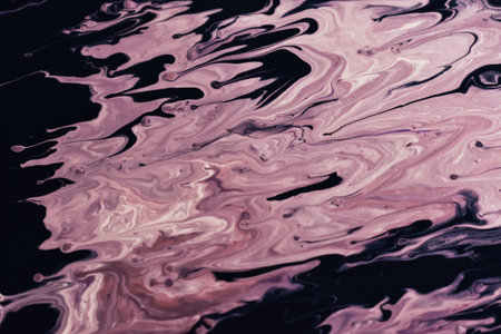 The colourful and messy  paint splattered on the paper