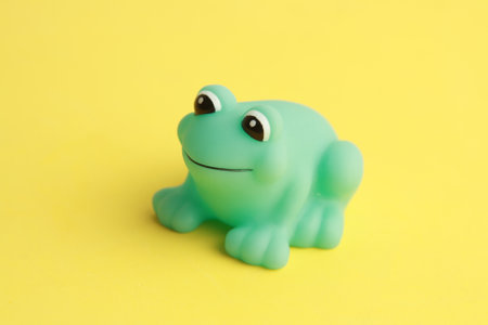 A closeup shot of a child toy for green frog bathtubの写真素材