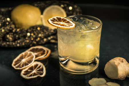 A closeup shot of an alcoholic cocktail with dried lemonの写真素材