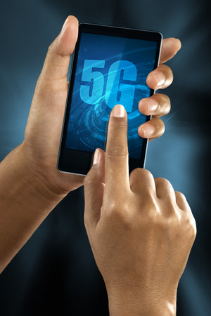 a woman finger connect to 5G network on a smart phone.の写真素材