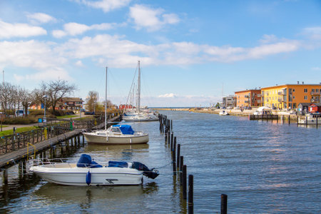 A closeup shot of mall boats docked by the coast near Malmo, Swedenの写真素材