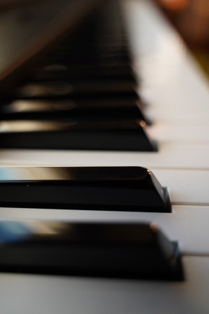 A vertical closeup of piano keysの写真素材