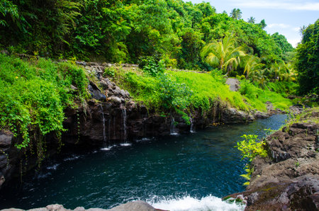 A mesmerizing shot of Afu Aau waterfall in Samoaの写真素材