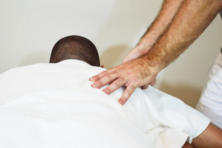 A physiotherapist doing manual treatmentの写真素材