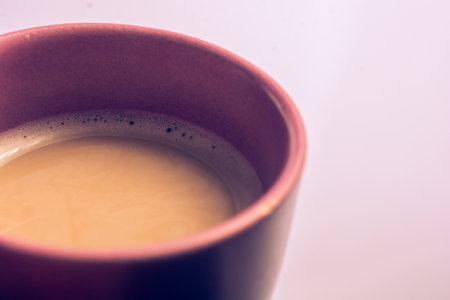 A high angle closeup shot of a cup full of coffeeの写真素材