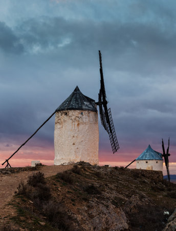 A vertical shot of traditional windmills in Consuegra, Toledo, Spain