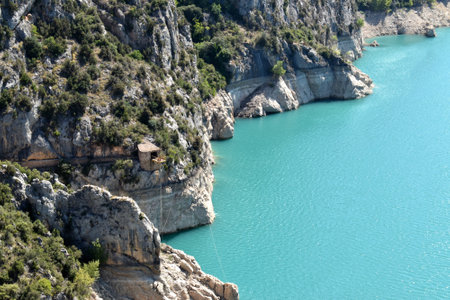 A high angle shot of a cliff and a blue seaの写真素材