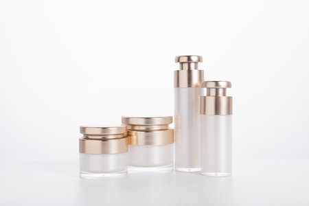 A set of skincare bottles and containers isolated on a white backgroundの写真素材