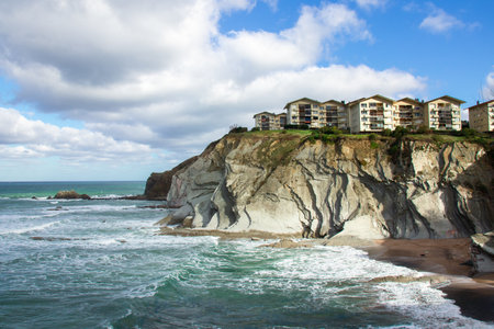A beautiful shot of the Playa Arrietara beach in Sopelana, Spainの写真素材