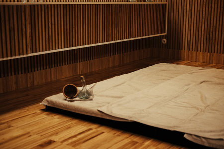 A mattress in a slat walled roomの写真素材