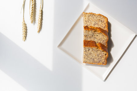 A closeup shot of wheat and slices of bread
