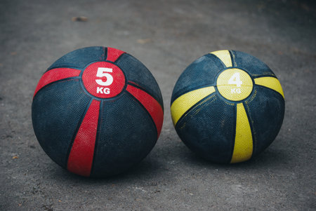 A closeup shot of weighted basketballs - concept of basketball/physical exerciseの写真素材