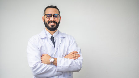 A Caucasian bearded doctor happily smilingの写真素材