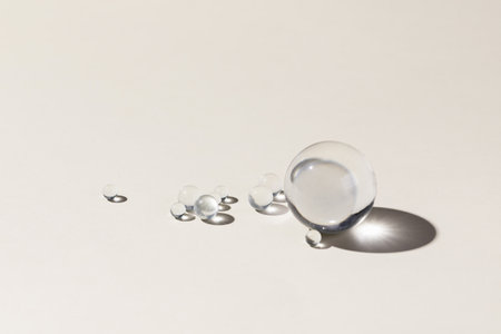 A closeup of little glass balls on a white backgroundの写真素材