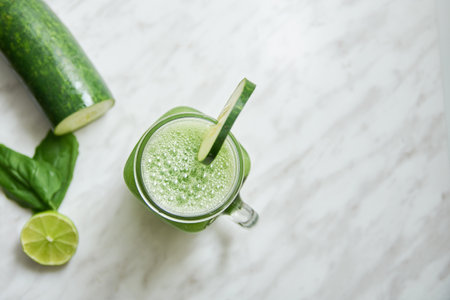 A top view of a fresh cucumber smoothie jar mugの写真素材