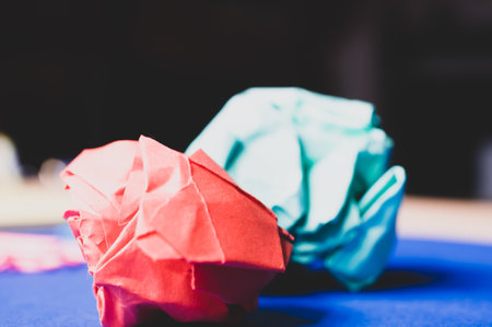 A closeup shot of crumpled colored paper ballsの写真素材