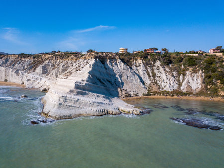 An aerial view of the beautiful white cliffs by the sea in Sicily, Italyの写真素材