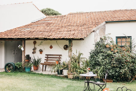 A small stone house with a beautfiul backyardの写真素材