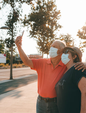 A vertical closeup shot of a Hispanic senior couple in the new normalityの写真素材