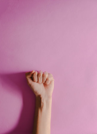 A vertical shot of clenched fist - concept of solidarity and supportの写真素材