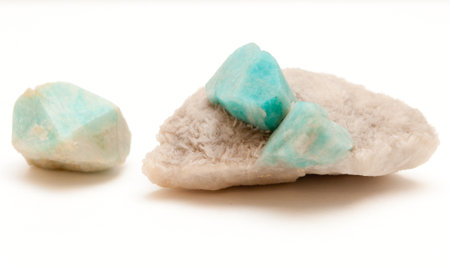 some amazonite gemstone mineral stuck in graniteの写真素材