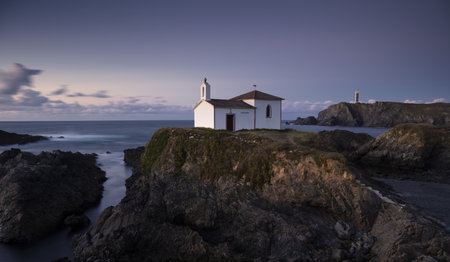 A beautiful view of Virxe do Porto chapel in Valdovino, Galicia, Spain