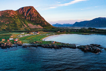 Aerial droneview of Gimsoy beach, sunny, summer sunset in Lofoten islands, Norway