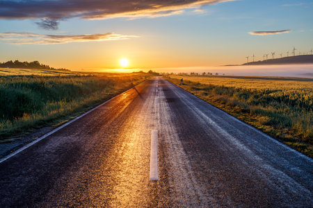 A beautiful view of a road at sunrise in the early morningの写真素材