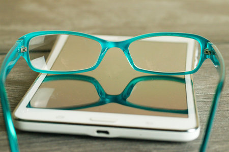 A selective focus shot of optical glasses on a tabletの写真素材