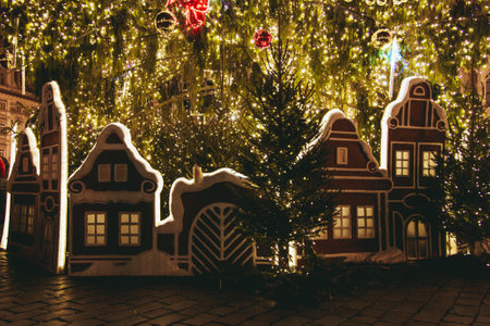 A view of stalls at Prague Christmas Market at Cathedral Square in the center of the city under  Christmas treeの写真素材