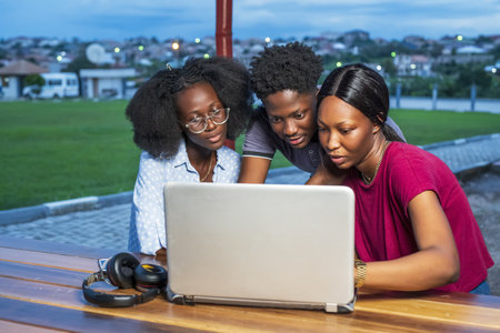 A closeup of African businesspeople working on a projectの写真素材