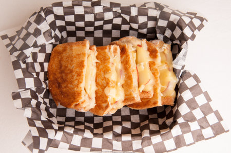 grilled cheese sandwiches with apple and brie, take out styleの写真素材