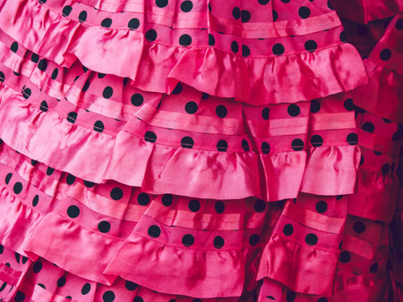 A closeup shot of pink ruffled Spanish flamenco textileの写真素材