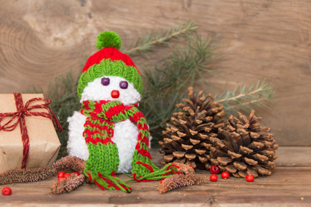 Snowman handmade with wool pompoms for Christmasの写真素材
