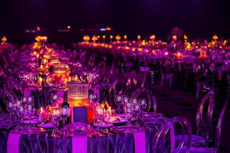 A gala dinner preparation, tables decorated with candlesの写真素材