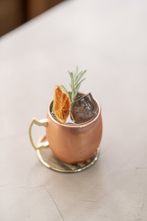 A vertical high angle shot of an exotic cocktail on the barの写真素材