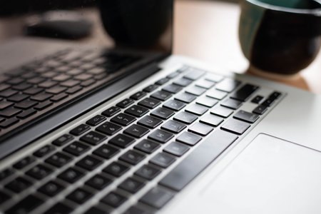 A closeup shot of a laptop on the tableの写真素材