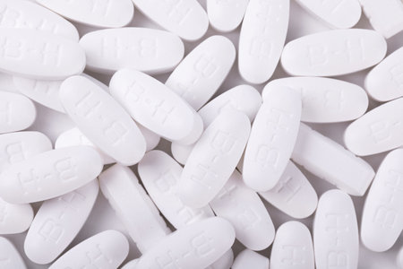 A closeup shot of white pharmaceuticals on a white background