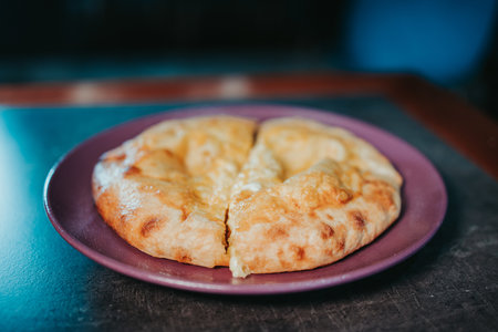 A closeup shot of delicious homemade pizza in a plateの写真素材