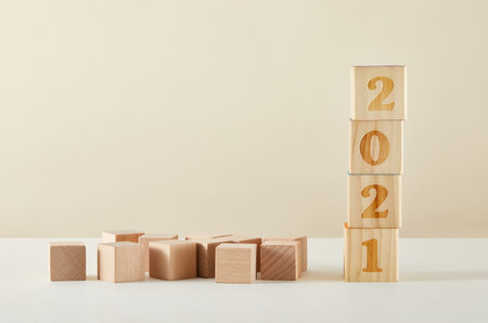 The concept of a new year - wooden cubes with numbers 2021の写真素材