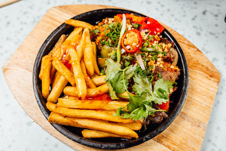 A closeup shot of delicious Vietnamese food including Pho ga, noodles, spring rolls on white backgroundの写真素材