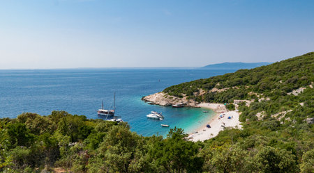 A mesmerizing shot of a beautiful beach under Lubenice village on island Cres, Croatiaの写真素材