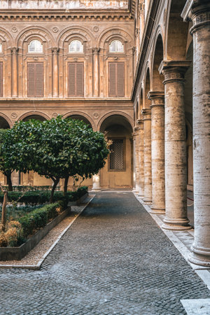 A vertical shot of a beautiful old historic building courtyard