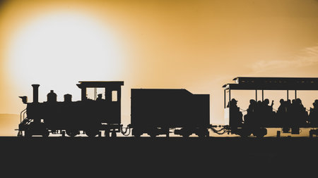 A beautiful silhouette of a passenger train on a sunny day