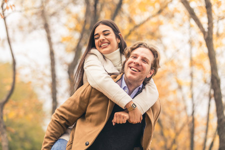 A shot of a young couple having fun in a park